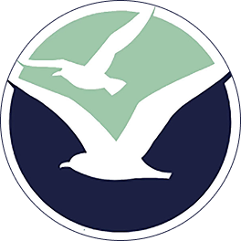 Charis Bay Collective's logo; a circle with two negative space seagulls.